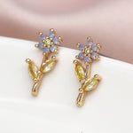 Faux gold flower stem crystal earrings 4321