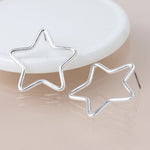 Silver plated worn open star earrings 4550