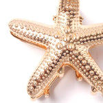 Starfish shaped metal hair clamp