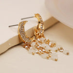 Faux gold plated crystal moon and star drop earrings