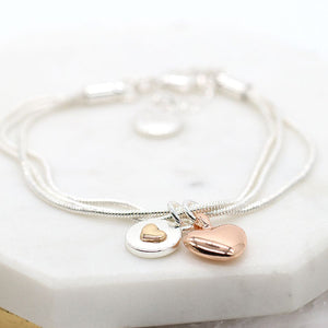 Silver plated and rose gold double heart charm bracelet 3389