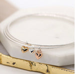 Silver plated triple fine bangle set with mixed metallic hearts 3375