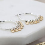 Silver plated hoop earrings with golden hammered discs 3350