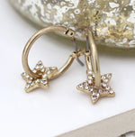 Worn gold hoop and crystal inset star earrings 3291